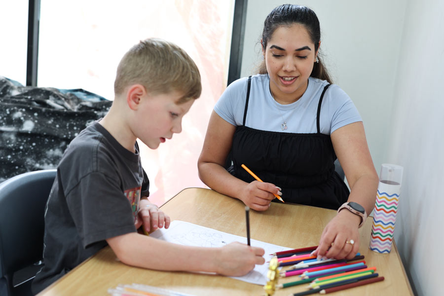 Adult and child colouring in together.jpg